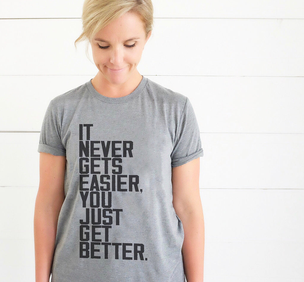 IT NEVER GETS EASIER, YOU JUST GET BETTER ADULT GRAPHIC T-SHIRT AND TANK BY EVERYKIND